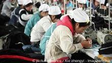 Female Chinese workers make clothings to be exported to the United States and Europe at a garment factory in Huaibei city, east Chinas Anhui province, 10 November 2010. Chinas consumer price index (CPI), the countrys gauge for inflation, rose 4.4% in October from a year earlier, accelerating from Septembers 3.6% rise, government data showed Thursday (11 November 2010). The producer price index, a gauge of factory-gate prices, rose 5.0% in October from a year earlier, higher than Septembers 4.3% rise and above the median 4.6% rise economists had expected. The CPI rose 3.0% the January-October period from a year earlier, and the PPI rose 5.5%.