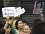 美媒：坠楼和中毒案凸显沸腾民怨直指北京(图)