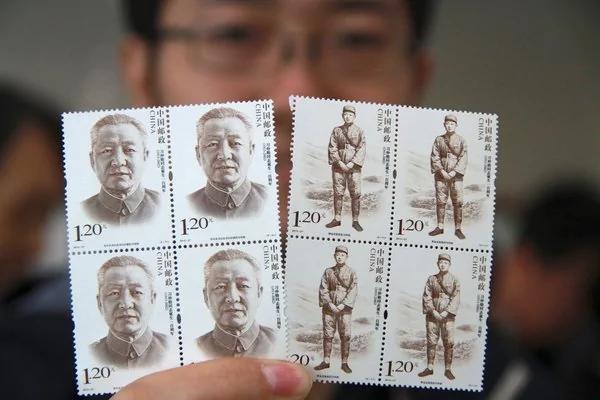 周二，为纪念习仲勋诞辰100周年发行的邮票。