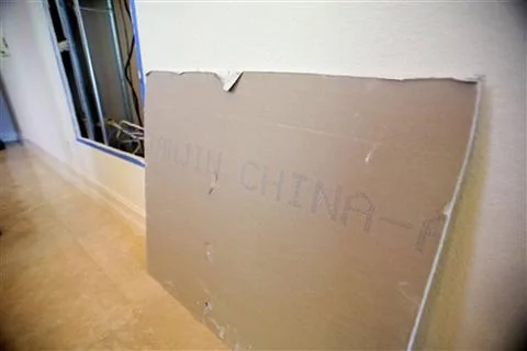 从佛罗里达一户民宅中拆下的中国干墙板