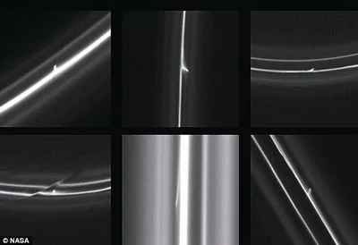 卫星照片显示土星光环被数百个不明物体击穿(组图)