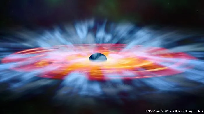 In this artist's illustration, turbulent winds of gas swirl around a black hole. Some of the gas is spiraling inward toward the black hole, but another part is blown away. Artwork
Credit: NASA, and M. Weiss(Chandra X-ray Center)
