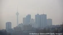 A general view of the Milad telecommunication tower and buildings engulfed by smog in the northwestern district of Tehran on December5,2012. Schools, universities and government agencies in the capital were closed on December4th and5th, due to the pollution. AFP PHOTO/BEHROUZ MEHRI(Photo credit should read BEHROUZ MEHRI/AFP/Getty Images)