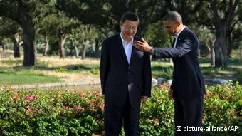 President Barack Obama gestures with Chinese President Xi Jinping at the Annenberg Retreat at Sunnylands as they meet for talks Friday, June7,2013, in Rancho Mirage, Calif. Seeking a fresh start to a complex relationship, the two leaders are retreating to the sprawling desert estate for two days of talks on high-stakes issues, including cybersecurity and North Korea's nuclear threats.(AP Photo/Evan Vucci)
