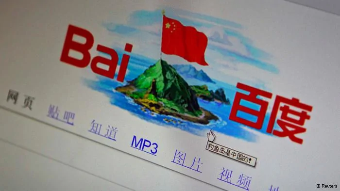 A photo illustration shows a graphic depicting a Chinese national flag flying atop of the disputed islands, called Senkaku by Japan and Diaoyu by China, being seen on the front page of Chinese search engine website Baidu, on a computer screen in Beijing, in this September18,2012 file photo. The Chinese characters below the graphic read, Diaoyu Islands belong to China! Picture taken September18,2012. To match Special Report CHINA-NAVY/ REUTERS/Stringer/Files(CHINA- Tags: POLITICS SCIENCE TECHNOLOGY BUSINESS)