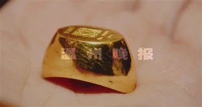 中国黄金9999金元宝。(图片来源：温州网)