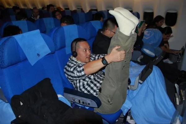妙招:教你坐长途飞机如何消除疲劳