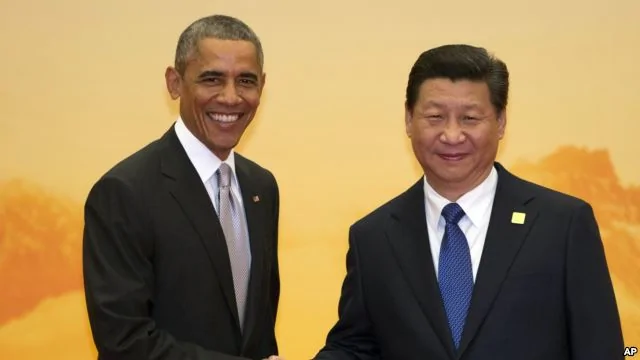 2014年11月11日，美國總統歐巴馬與中共國家主席習近平在亞太經合組織峰會歡迎儀式上會面。