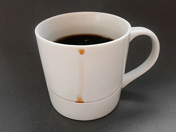 A coffee cup that grabs your drips.