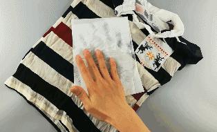 神奇!几秒钟拧干衣服 比洗衣机甩干还快