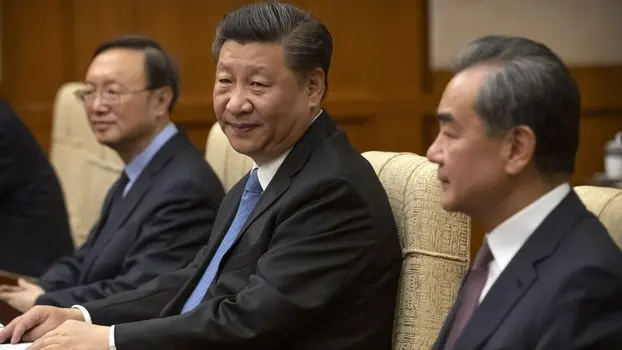  中共国家主席习近平（中）2019年7月9日在一场外事活动上。（美联社）