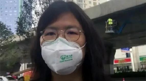 張展被綁上法庭 曾受訪談「無法後退」
