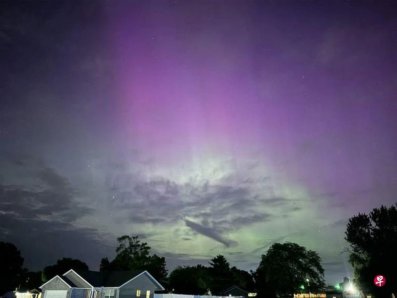 由瑞安·普鲁伊特提供的这张照片，显示了5月10日美国俄亥俄州上空因地磁暴出现罕见的北极光。（法新社）
